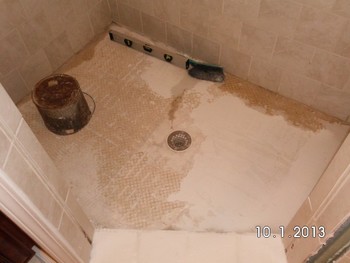 Before Ceramic Tile Flooring of a Shower in Dunwoody, GA